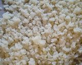 A picture of step 1 of Easy Cheesy Riced Cauliflower.