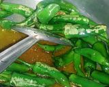 A picture of step 2 of Gajer Mouli or Hari Mirch ka Achar.