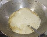 A picture of step 2 of Paneer corn capsicums in white greavy.
