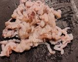 Foto del passaggio 2 della ricetta Calamari farciti con provola e pinoli