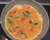 A picture of step 2 of Omelette (chips-egg omelette).