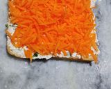 A picture of step 4 of Carrot toast with cheese spread.