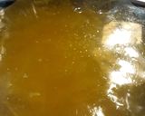 A picture of step 2 of Swiss on Chicken atop Linguine.