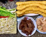 A picture of step 1 of Dried Squid Congee.