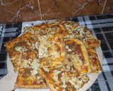 صورة لخطوة 8 من وصفة بيتزا كاري بباتي الدجاج الحار 🌶️🍕