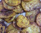 A picture of step 8 of Tawa potato fry.
