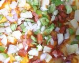 A picture of step 3 of Veg cheese Pizza.