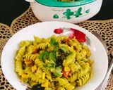 A picture of step 1 of CREAMY PESTO PASTA 😋 With BASIL Leaves.