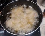 A picture of step 3 of Cajun Potatoes (baby potato cornflour).
