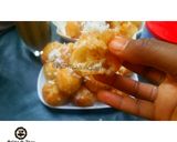 A picture of step 4 of Coconut puff puff.