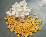 A picture of step 1 of Paneer corn salad.