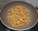 A picture of step 2 of Ground nut chikki.
