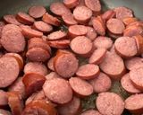 A picture of step 2 of Kielbasa with Bell peppers and Cabbage 🥬🫑.