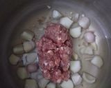A picture of step 1 of Aloo Qeema.