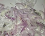 A picture of step 1 of Crispy onion pakoray.