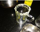 A picture of step 3 of Honey and mint iced green tea shots.