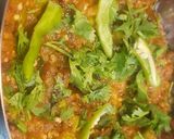 A picture of step 8 of Cooked Eggplant bharta with peas.