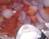 A picture of step 3 of Onian tomato carrot salad.
