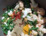 A picture of step 3 of Cauliflower French Beans and Green Peas Curry.