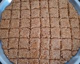 A picture of step 5 of Til & peanut crush chikki.