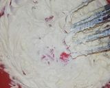 A picture of step 7 of Red Velvet çhoçolate inside Cupcakes with cream cheese frosting.