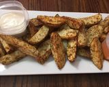 A picture of step 6 of Baked garlic parmesan potato wedges.