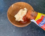 A picture of step 2 of Corn cake with bacon and sriracha mayo sunny side up.
