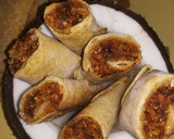 A picture of step 10 of Dates with coconut roll in chapati (sweeten roll).