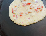 A picture of step 3 of Sattu Chilla with veggie.