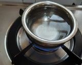 A picture of step 1 of Ragi flour bhakri (nachni chi bhakri with brinjal bharta).