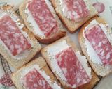A picture of step 3 of Bruschette with goat's cheese and salame.