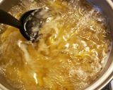 A picture of step 15 of Tuscan Chicken & Shrimp pasta.