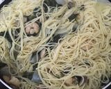 A picture of step 9 of Buttery shrimp scampi in a white wine sauce over angel hair pasta#mycookbook.