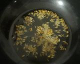 A picture of step 1 of Khatti mithi green chilli.