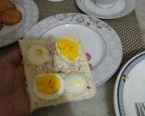 A picture of step 2 of Chicken egg sandwitch with tea.