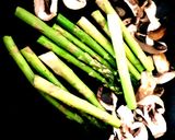 A picture of step 2 of My Roasted Garlic Asparagus with sundried Tomato & Mushrooms. 😁.