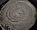 A picture of step 3 of Cone dosa with masala.