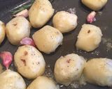 A picture of step 2 of Rock Salt & Garlic Crushed Roasties.