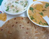 A picture of step 9 of Heirloom Traditional Thali ---- Dhokli Nu Shake, Jaggery, Bhakri, & Chaas.