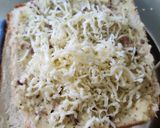 A picture of step 2 of Cheesy garlic bread.