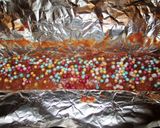 Foto del paso 3 de la receta Tarta de galletas bañadas con budín al caramelo y chocolate de avellanas