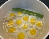 A picture of step 4 of Egg Yolk Mochi Dumplings in Ginger Syrup.