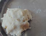 A picture of step 3 of Chocolate coated Hazelnut filled coconut laddu.