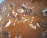 Foto del paso 10 de la receta: Caldereta de cordero con vino tinto, huevo duro y almendras