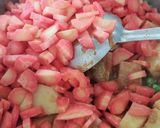 A picture of step 3 of Aloo matar gajar mix veggies.