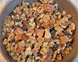 Foto del paso 4 de la receta: Budín de frutos secos aromatizado con mandarina