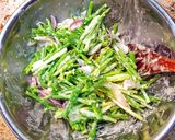 A picture of step 2 of Pajeon (spring onion pancakes).