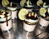 A picture of step 6 of Orange lemon posset shoters.
