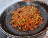 A picture of step 4 of Cashew matar masala.