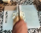 Foto del paso 9 de la receta Tortilla de brócoli con sobre mesa de tomate